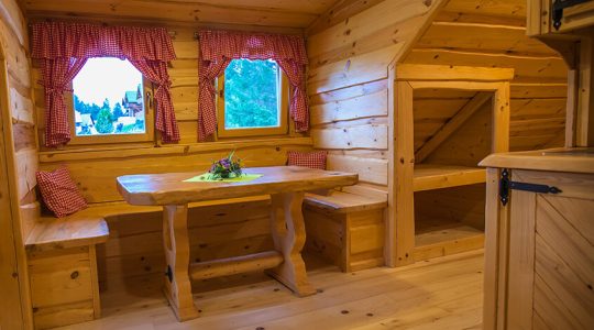 The interior of a log cabin accommodation at Lake Bloke, Nova Vas, Slovenia
